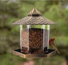 Put all together, it makes a fun, modern bird feeder that would look great on a porch, deck, or outside of a window. China Twinkle Star Wild Bird Feeder Hanging For Garden Yard Outside Decoration Lighthouse Shaped On Global Sources Wild Bird Feeder Wood Bird Feeder Hanging Bird Feeder