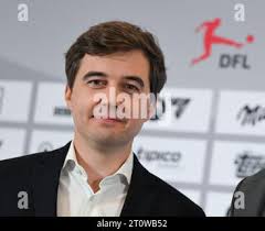 09 October 2023, Hesse, Frankfurt/Main: Steffen Merkel (r) and Marc Lenz,  the two managing directors of DFL GmbH, leave the podium following the  press conference