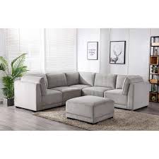 This living room furniture style offers versatile modular design, a plus if you enjoy rearranging your decor. Belize Fabric Sectional Costco