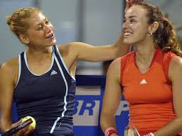 A single word that carried a tonne of significance. Ash Barty Joins Williams Sisters Martina Hingis And Pat Rafter With Stunning Record Cairns Post