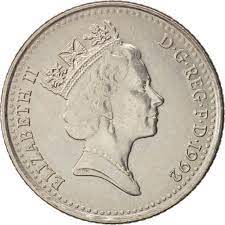 The royal mint started issuing these 0.1 british pound coins in 1992. Ten Pence 1992 Small Coin From United Kingdom Online Coin Club