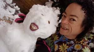 Liz Carr smiling next to her toothy snowman. Being thin and therefore without much insulation, I&#39;m always cold. I take a hot water bottle to bed pretty much ... - liz_carr_and_snowman