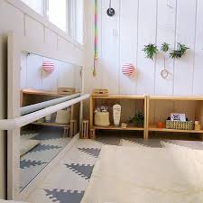 The Pull Up Bar Across The Floor Mirror Is The Classic Montessori Nursery Addition For A Mobile Baby Montessori Bedroom Montessori Playroom Montessori Nursery