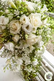 A lady with a little dog. Blush Pink And Cream Wedding Flowers At The Mere Resort Laurel Weddings