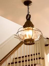 House Tours Cottage By The Sea Cottage Lighting Iron Lighting Foyer Lighting Fixtures