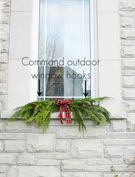 This modern daisies flowers under the window metal artwork makes it the focal point of any room or office. A Garland Hack And How To Make And Hang Window Christmas Swag