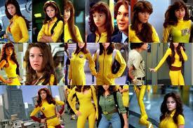 KREA - beautiful brown hair female reporter in a yellow jumpsuit character april  o ' neil from teenage mutant ninja turtles ( tmnt 1 9 8 7 )