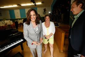 On the cover, she's sporting her signature chuck taylors with a sleek suit — and naturally, she rocks the combo better than anyone we've ever. U S Senator Elect Kamala Harris Stylishly Wins California Vogue