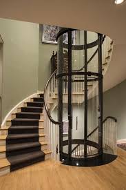 Spiral Staircase In 2020 House Elevation Elevator Design Round Stairs