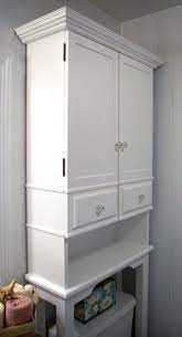 It features a durable white finish and satin nickel hardware. Pin By Karl Oberjohn On Bathroom Bathroom Storage Over Toilet Bathroom Cabinets Over Toilet Over Toilet Storage