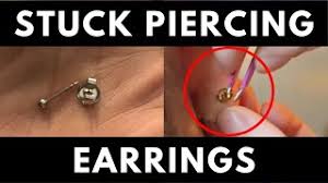 I got my ear cartilage pierced last monday with a needle at a tattoo/piercing place. Removing Stuck Butterfly Backing Piercing Earrings She Didn T Cry Youtube