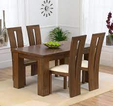 You can do a single runner, laid straight across the middle of the table, with one person sitting at either end of the runner, and the other guests filling in the spaces in between. Dining And Kitchen Modern And Elegant Big Square Dining Table For Four Person That Look Wood Dining Room Table Dining Table Design Modern Square Dining Tables