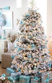 Ljy 40 pieces 2.3 inches resin pencil finger starfish with rope for christmas tree hanging ornaments beach theme wedding home decor & diy craft project, 10 colors 4.7 out of 5 stars 355 $20.49 $ 20. White Flocked Coastal Christmas Tree Ideas With Blue Ornaments Shop The Look Coastal Christmas Decor Indoor Christmas Decorations Beach Christmas