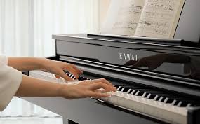 Pianist hands playing piano keyboard. Kawai Announces New Dg30 Digital Grand Piano News Kawai Musical Instruments Manufacturing Co Ltd