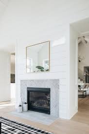 Herringbone wall tiling makes the striking declaration of simpleness and class in different space. Gray Shiplap Fireplace Wall Design Ideas