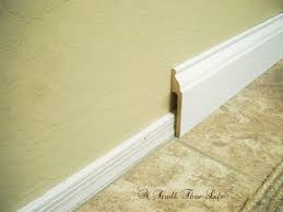 Install Wide Baseboard Molding Over Existing Narrow Baseboard A Stroll Thru Life Diy Home Repair Baseboard Styles Home Diy