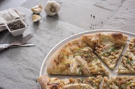 California Pizza Kitchen Celebrates National Pizza Month With The Return Of Two Fan Favorites Roasted Garlic Chicken Pizza Shrimp Scampi Pizza Business Wire