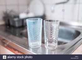 dirty and clean glass cups on a kitchen