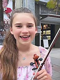 Karolina Protsenko and Her Dad Perform a Romantic Song Together