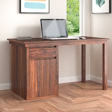 The table is designed in a scandinavian. Flavia Sheesham Wood Computer Table With Storage Decornation