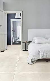 Glazed ceramic tile can remain functional in your home for half a century. Walkway Scratched Concrete Look Porcelain Tiles Creative Materials Bedroom Floor Tiles Floor Tiles Design Bedroom Tile