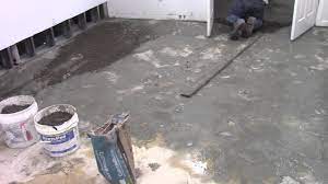 To level a basement floor, start by removing any furniture and appliances on it and then thoroughly cleaning it. Leveling Basement Floor For New Tiles Youtube