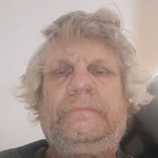 Why is there an antifreeze smell in my 98 Mazda MPV without any leaks or  overheating?