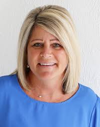 Kalona poodle earns champion dog show title