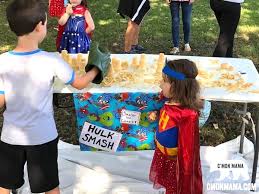 Use sidewalk chalk to draw a very large (huge!) oversized game board. An Epic Superhero Birthday Party C Mon Mama