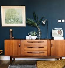 Unfortunately, we cannot provide any information about where the designer got the curtains, but the tone is undoubtedly navy. Bubby And Bean Living Creatively Paint Love Dark Blue Walls