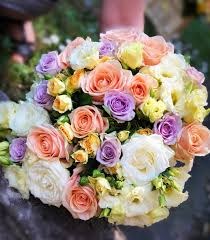 Although red flowers are most commonly associated with feelings of true love and passion, they can also be used to convey respect, desire, and courage. Pastel Color Flower Bouquet Of Roses And Eustomas