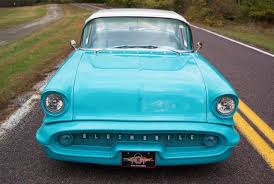 Image result for Artesian Blue 1957 Oldsmobile