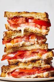 Get dinner on the table with ease tonight using one of our simple supper recipes, many of them ready in just 45 minutes or less. Ultimate Grilled Tomato Sandwiches Recipe Recipe Summer Sandwiches Tomato Sandwich Recipes Tomato Sandwich