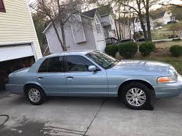 Image result for Light Ice Blue 2003 Crown Victoria