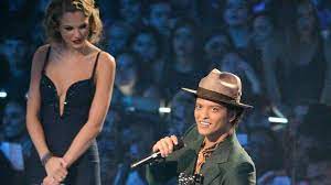 Bruno's height, believe it or not, is at. Bruno Mars Standing Next To Tall People Will Make Your Day Entertainment Tonight