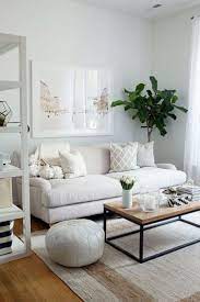 Many Small Living Room Ideas Revolve Around Tricking The Eye Into Ma Small Apartment Decorating Living Room Small Living Room Decor Living Room Decor Apartment