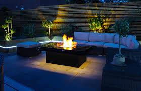 Before you have your outdoor fire pit installed, know your city's rules and regulations for fire safety. Discover These Fire Pit Table Ideas For Your Garden Houzz Uk