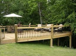 Deck Built Onto Sloped Yard Railings Sloped Backyard Sloped Yard Backyard