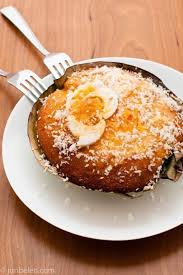 Bibingka Filipino Rice Cake With Grated Coconut And Salted Egg Filipino Desserts Food Rice Cakes