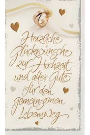 Darüber sieht man einen handschriftlichen schriftzug vor rotem hintergrund: Gluckwunschkarte Hochzeit Goldene Schrift