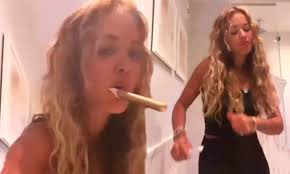 Rita Ora shows off her hilarious moves as she brushes her teeth while  dancing to Louis Theroux rap