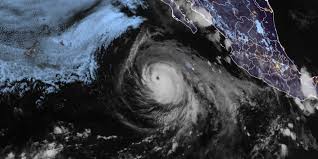 Genevieve churns as a Category 2 hurricane as it barrels through the Eastern Pacific