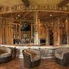 Choose a bar made with distressed wood and rustic hardware. 1