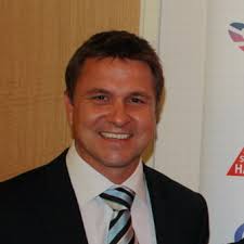 DEAN WARREN IS NEW LIONS FOOTY BOSS