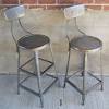 24 white metal bar stools with wood seat. 1