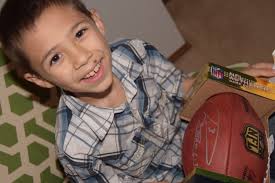 8-year-old Seahawks fan receives game ball signed by Russell Wilson