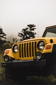 Hd Wallpaper Skirt Skirt Jeep Grill Car Bokeh Blur Tree Yellow Headlight Wallpaper Flare Cars, road, vehicles, landscape, blur, chevrolet, daylight, low rider.