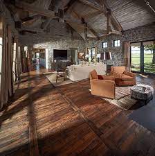 13 Reasons Reclaimed Wood Is So Hot Right Now Designed Stone Wall Design Traditional Family Rooms Flooring