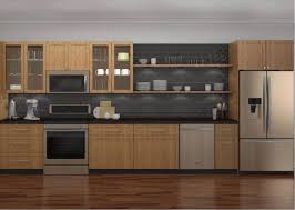 Whirlpool Sunset Bronze Kitchen Appliances Set In Medium Wood Grain Cabinetry With A Dark Gre Backsplash For White Cabinets Dark Gray Backsplash Bronze Kitchen