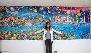 Puzzled By Jigsaw Addicts Meet The Woman Who Spent 17 Months Sticking 24 000 Pieces To Her Living Room Wall Disney Puzzles Big Puzzles Jigsaw Puzzles